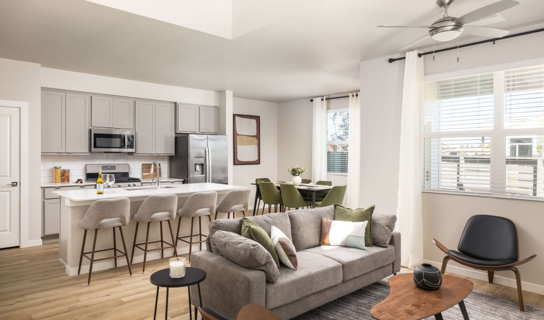 Open living room and kitchen at Vella Terra rental homes in Loveland Open living room and kitchen at Vella Terra rental homes in Loveland